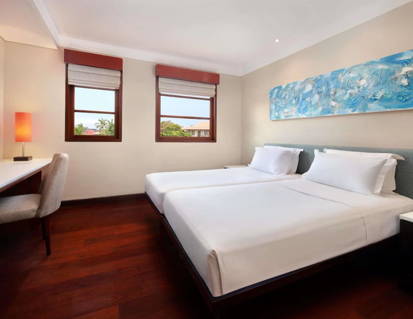Habitación familiar Vista Piscina Vista Jardín 4 habitaciones 4 camas individuales 2 Camas king kitchenette del hotel Novotel Bali Nusa Dua Hotel & Residence. Foto 8