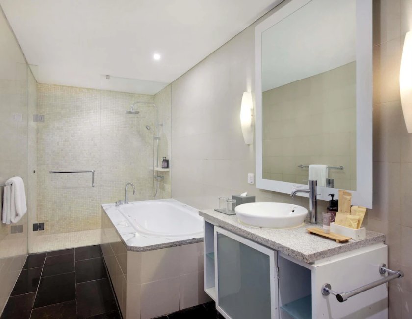 Habitación familiar Vista Piscina Vista Jardín 4 habitaciones 4 camas individuales 2 Camas king kitchenette del hotel Novotel Bali Nusa Dua Hotel & Residence. Foto 13