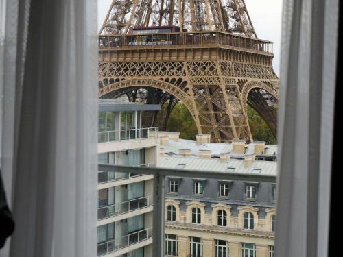 Ático Eiffel con vistas - 1 cama extragrande - Planta superior del hotel Pullman Paris Tour Eiffel