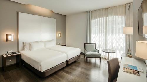 Habitación Doble Estándar - 1 o 2 camas del hotel Sercotel Coliseo. Foto 2