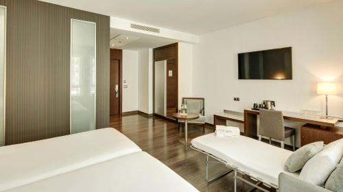 Habitación Triple del hotel Sercotel Coliseo. Foto 2