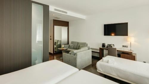 Habitación Doble Superior - 1 o 2 camas del hotel Sercotel Coliseo. Foto 3