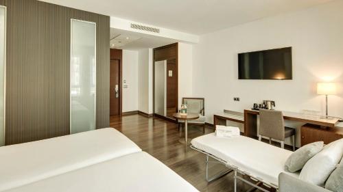 Habitación Triple del hotel Sercotel Coliseo. Foto 8