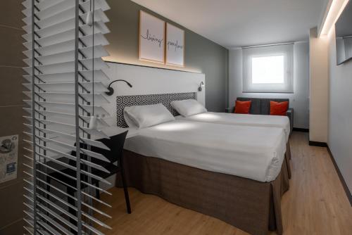 Habitación Doble - 1 o 2 camas del hotel Bed4u Pamplona. Foto 1