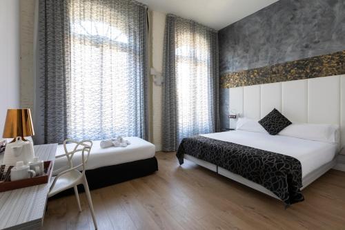 Habitación Triple del hotel Petit Palace Savoy Alfonso XII. Foto 2