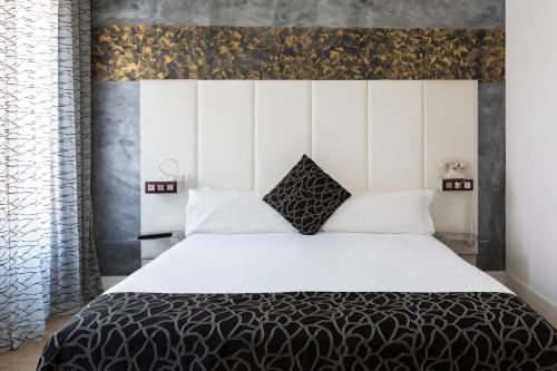 Habitación Triple del hotel Petit Palace Savoy Alfonso XII. Foto 3