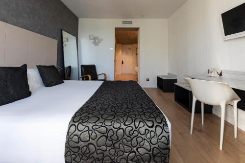 Habitación Cuádruple del hotel Petit Palace Santa Barbara