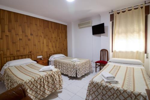 Habitación Triple del hotel Virgen De Los Reyes