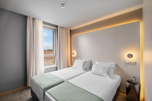 Habitación Doble Estándar - 2 camas del hotel Basic Braga By Axis. Foto 1