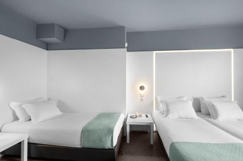 Habitación Triple del hotel Basic Braga By Axis. Foto 1
