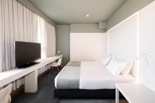 Habitación Doble Estándar - 2 camas del hotel Basic Braga By Axis. Foto 1