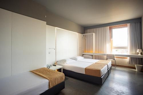 Habitación Triple del hotel Basic Braga By Axis. Foto 1