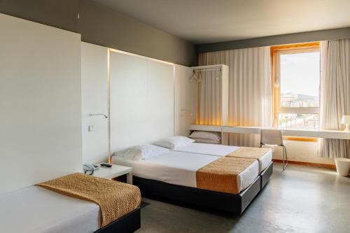 Habitación Triple del hotel Basic Braga By Axis. Foto 2