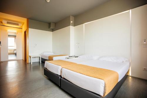 Habitación Triple del hotel Basic Braga By Axis. Foto 3
