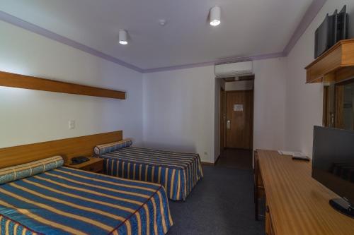 Habitación Doble con baño privado - 2 camas del hotel Teresinha. Foto 12