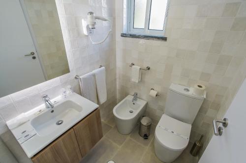 Habitación Triple con baño privado del hotel Teresinha