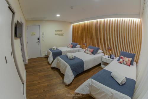 Habitación Triple con baño privado del hotel Teresinha. Foto 1