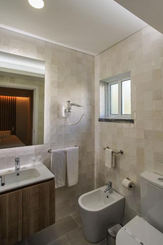 Habitación Triple con baño privado del hotel Teresinha. Foto 3