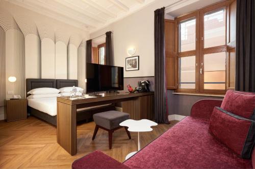 Habitación Triple Deluxe del hotel Navona Palace Collection. Foto 5