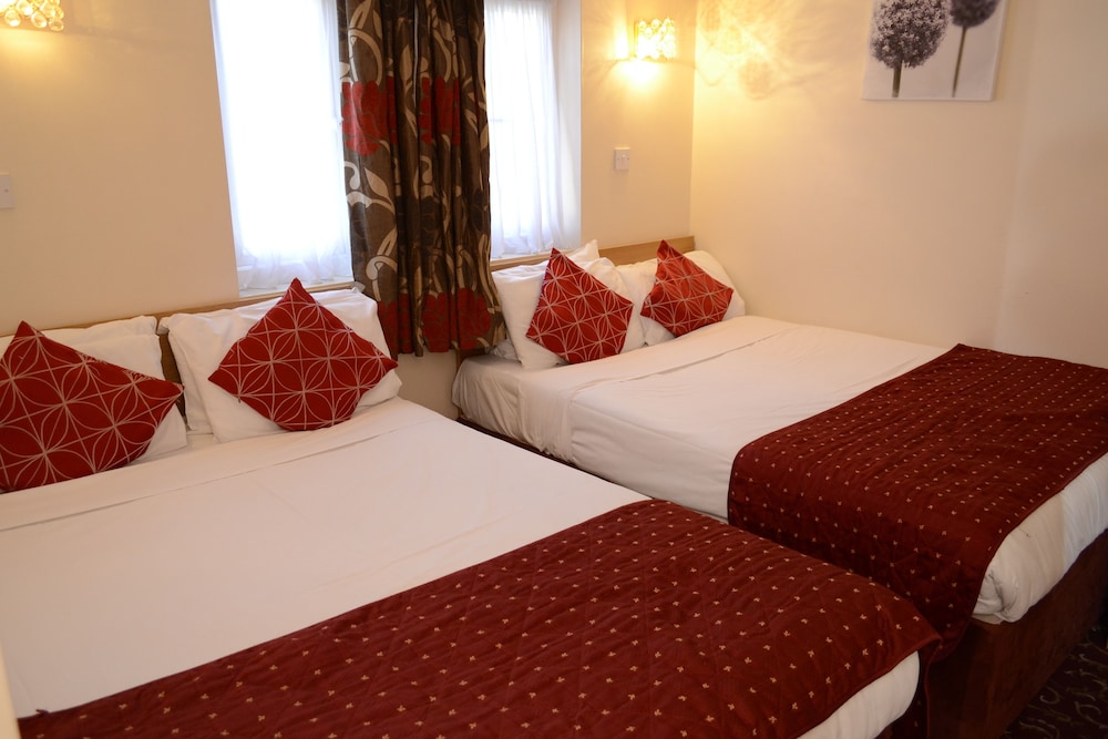 Habitación familiar del hotel Britannia Inn. Foto 11