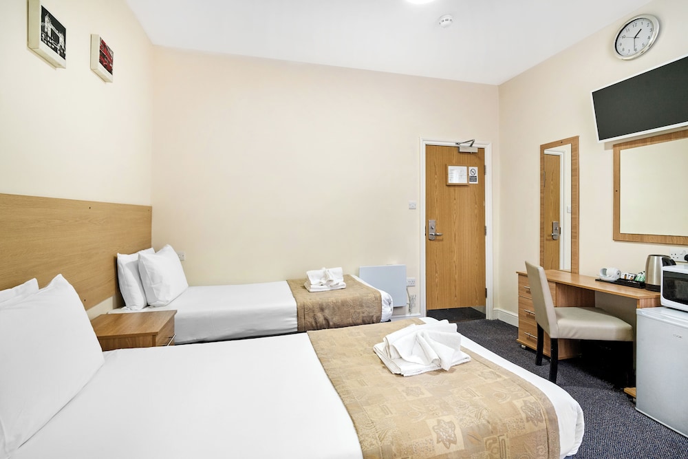 Habitación con 2 camas individuales del hotel Britannia Inn