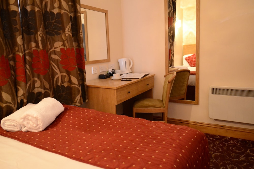 Habitación con 2 camas individuales del hotel Britannia Inn. Foto 4