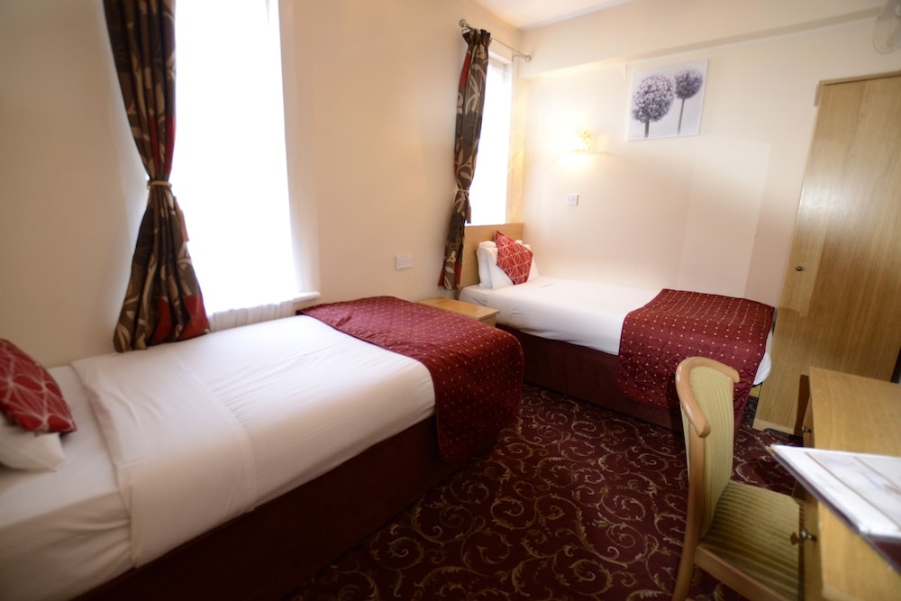 Habitación con 2 camas individuales del hotel Britannia Inn. Foto 5