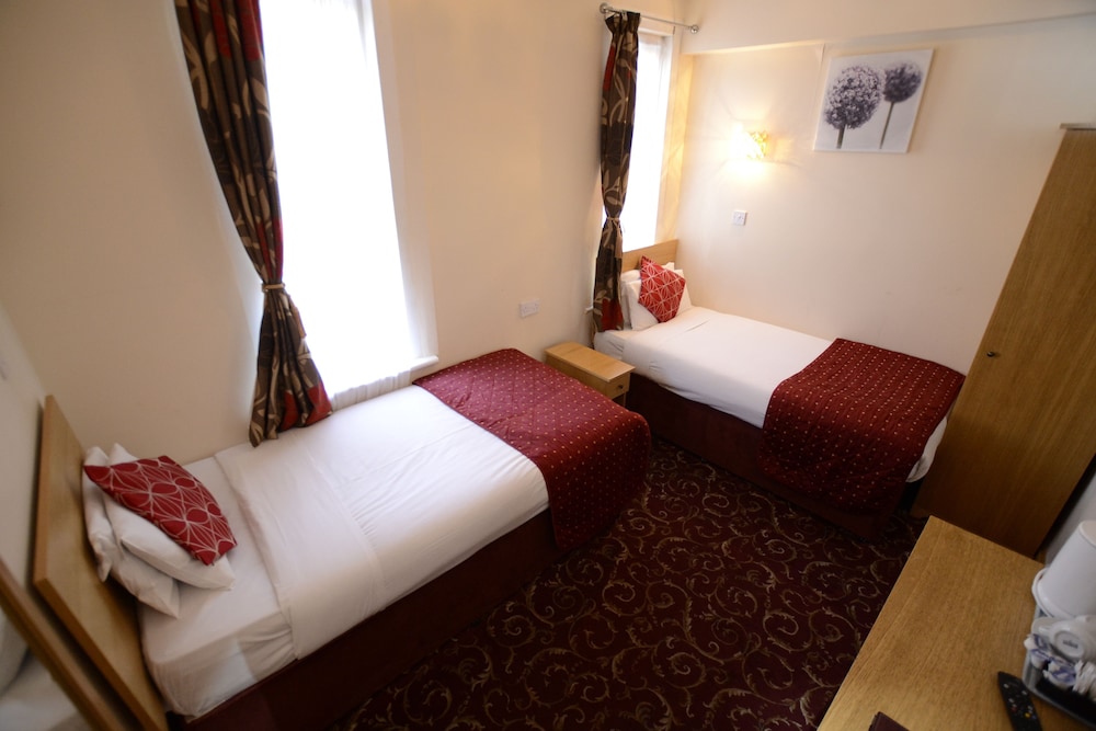 Habitación con 2 camas individuales del hotel Britannia Inn. Foto 6