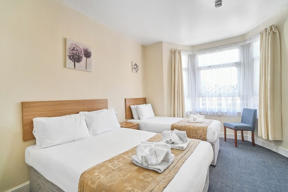 Habitación con 2 camas individuales del hotel Britannia Inn. Foto 10