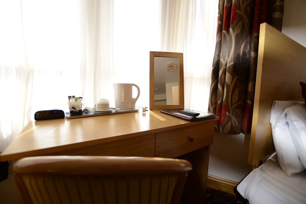 Habitación triple del hotel Britannia Inn. Foto 2
