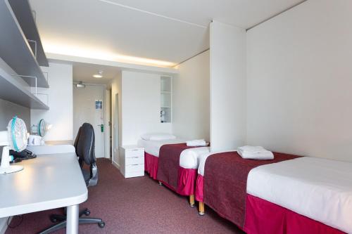 Habitación Doble con baño privado - 2 camas del hotel Prince's Gardens - Campus Accommodation. Foto 6