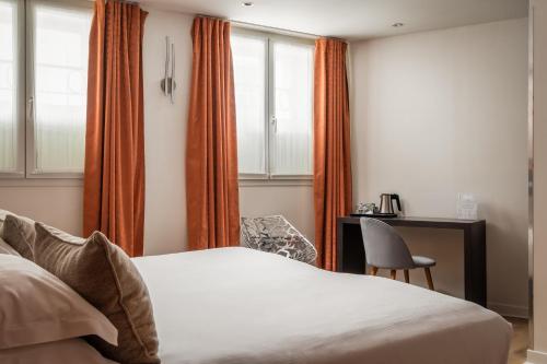 Habitación Triple del hotel Arc De Triomphe. Foto 4