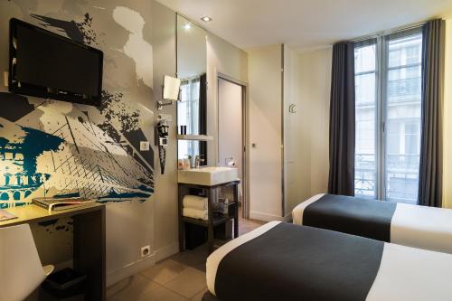 Habitación Doble Clásica - 2 camas del hotel Arc de Triomphe Etoile. Foto 3