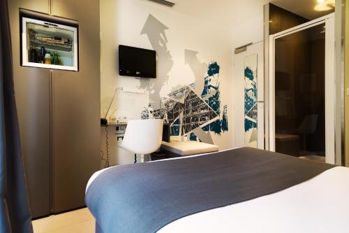 Habitación Doble Clásica del hotel Arc de Triomphe Etoile. Foto 4