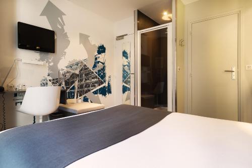 Habitación Doble Clásica del hotel Arc de Triomphe Etoile. Foto 5