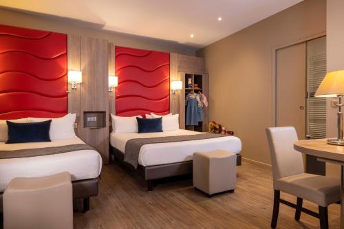 Habitación cuádruple del hotel L'Interlude. Foto 4