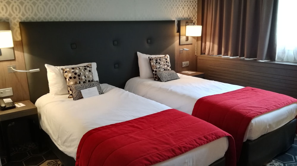Habitación Clásica con camas individuales del hotel Mercure Orange Centre. Foto 1