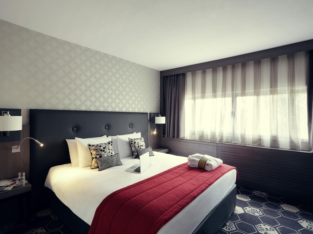 Suite con 1 cama doble y 1 sofá - cama doble del hotel Mercure Orange Centre. Foto 3