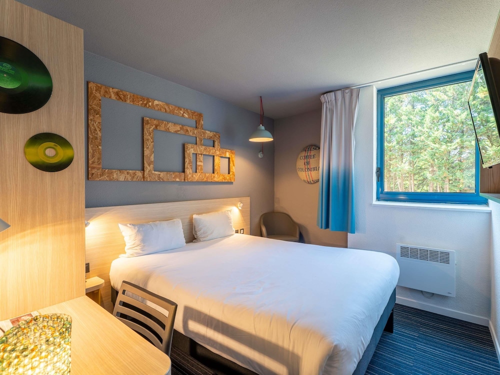 Habitación Pop con una cama doble del hotel Greet Bordeaux Aeroport