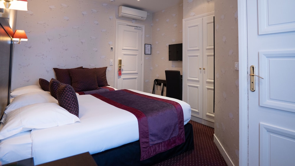 Habitación triple ejecutiva del hotel Hotel Virgina