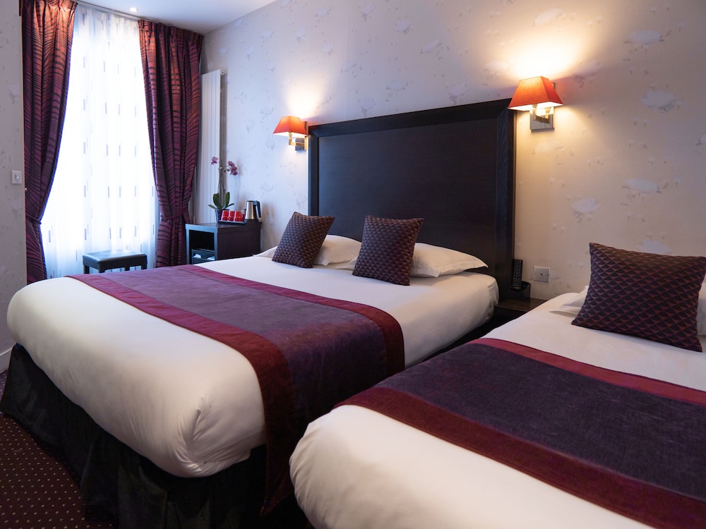 Habitación triple ejecutiva del hotel Hotel Virgina. Foto 3