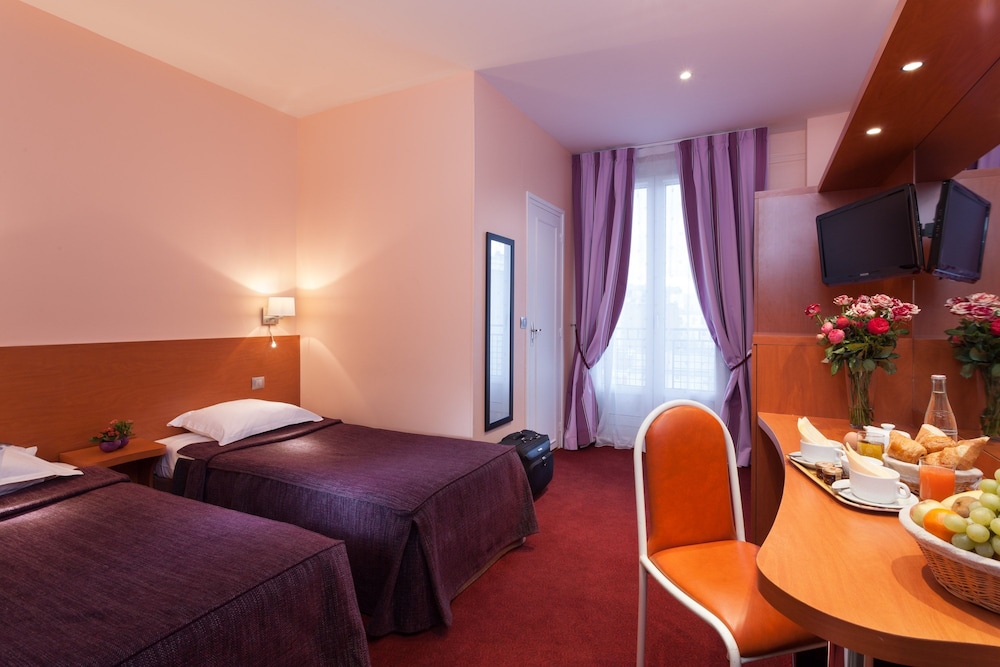 Habitación cuádruple del hotel Hotel Virgina. Foto 1