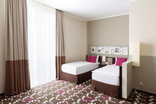 Habitación Doble Estándar del hotel Mercure Moa Berlin. Foto 3