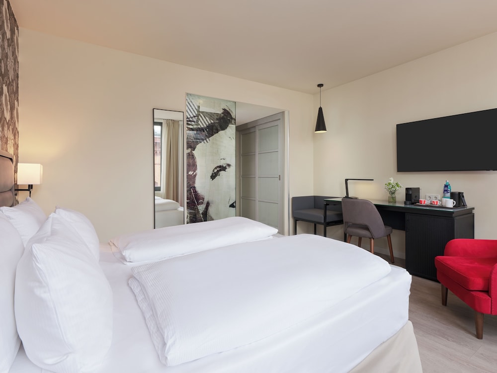 Habitación Deluxe del hotel H10 Berlin Ku'damm. Foto 1