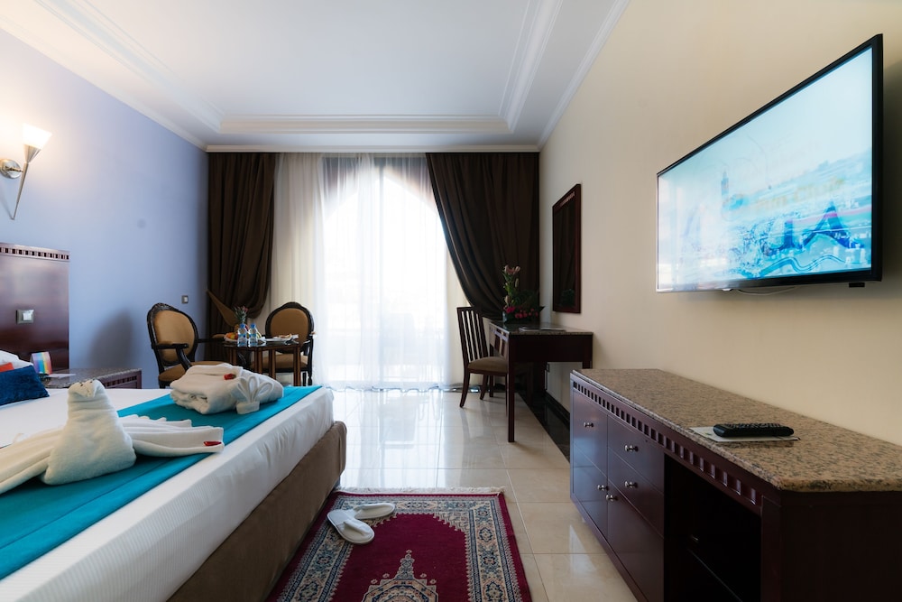 Deluxe Double, Garden View del hotel Pickalbatros Aqua Fun Club All Inclusive. Foto 4