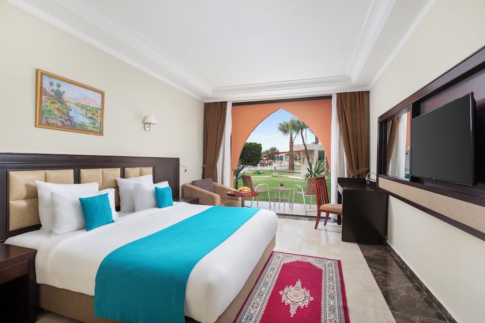 Deluxe Double, Garden View del hotel Pickalbatros Aqua Fun Club All Inclusive. Foto 8