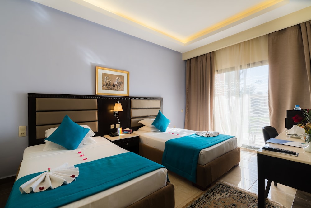 Deluxe Twin Garden View del hotel Pickalbatros Aqua Fun Club All Inclusive. Foto 3