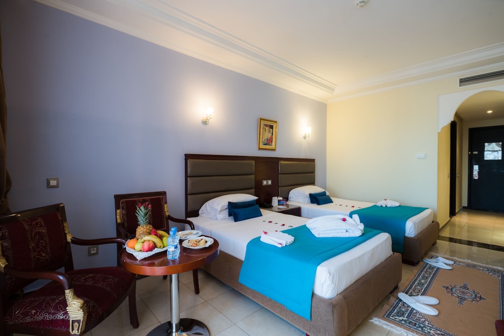 Deluxe Twin Garden View del hotel Pickalbatros Aqua Fun Club All Inclusive. Foto 4