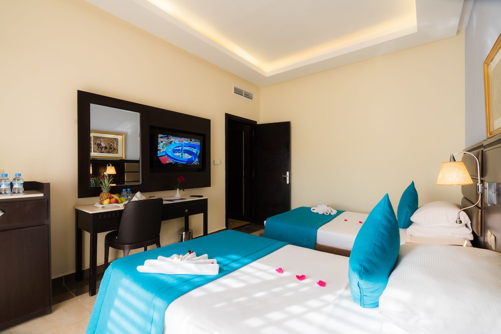 Deluxe Twin Garden View del hotel Pickalbatros Aqua Fun Club All Inclusive. Foto 5
