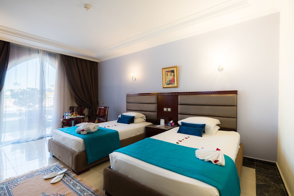 Deluxe Twin Garden View del hotel Pickalbatros Aqua Fun Club All Inclusive. Foto 6